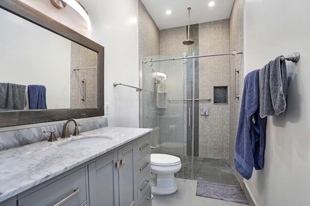 6595 NW 32nd Ter, Boca Raton, FL 33496 - bathroom featuring vanity, a shower stall, toilet, and recessed lighting