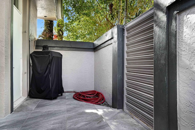 6595 NW 32nd Ter, Boca Raton, FL 33496 - view of patio / terrace featuring a grill