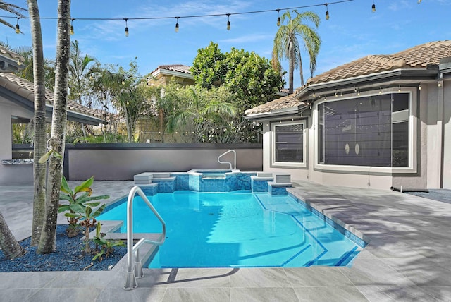 6595 NW 32nd Ter, Boca Raton, FL 33496 - view of swimming pool featuring a patio and a pool with connected hot tub