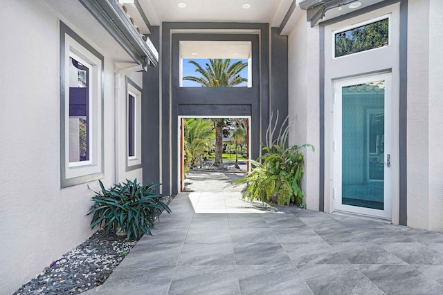 6595 NW 32nd Ter, Boca Raton, FL 33496 - doorway to property with stucco siding