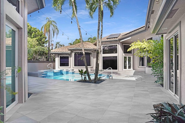 6595 NW 32nd Ter, Boca Raton, FL 33496 - outdoor pool with an outdoor hot tub and a patio