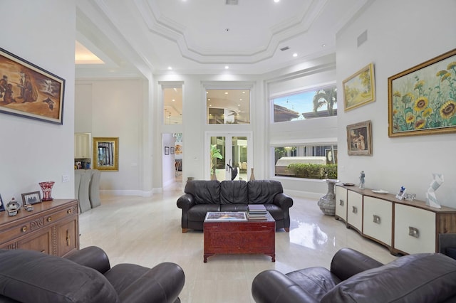 6595 NW 32nd Ter, Boca Raton, FL 33496 - living room with a high ceiling, ornamental molding, recessed lighting, a raised ceiling, and french doors