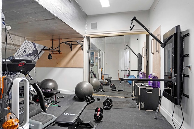 6595 NW 32nd Ter, Boca Raton, FL 33496 - workout room featuring baseboards