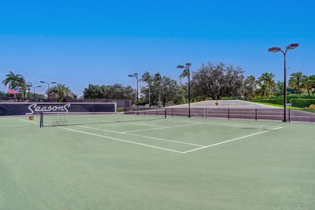 6595 NW 32nd Ter, Boca Raton, FL 33496 - view of tennis court with community basketball court