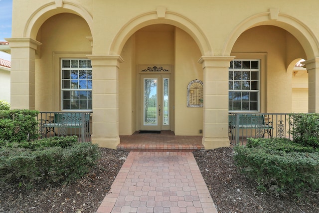 doorway to property with covered porch