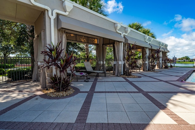 view of patio / terrace with a water view