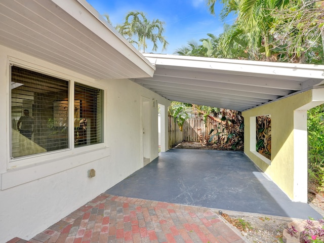 view of car parking featuring a carport