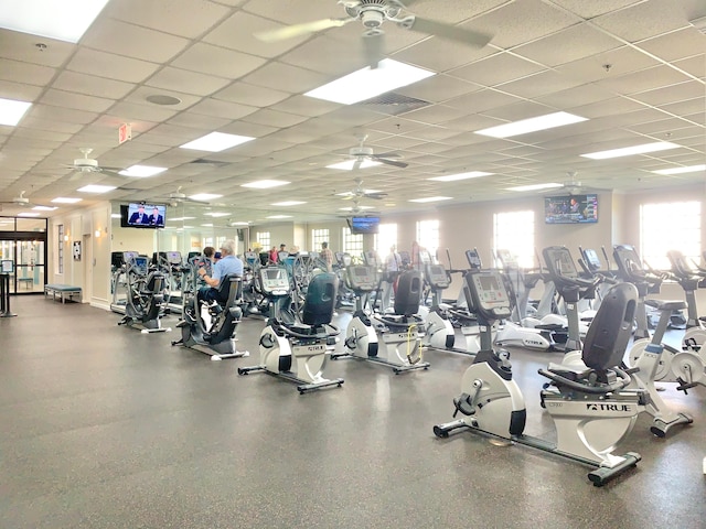 workout area featuring a paneled ceiling