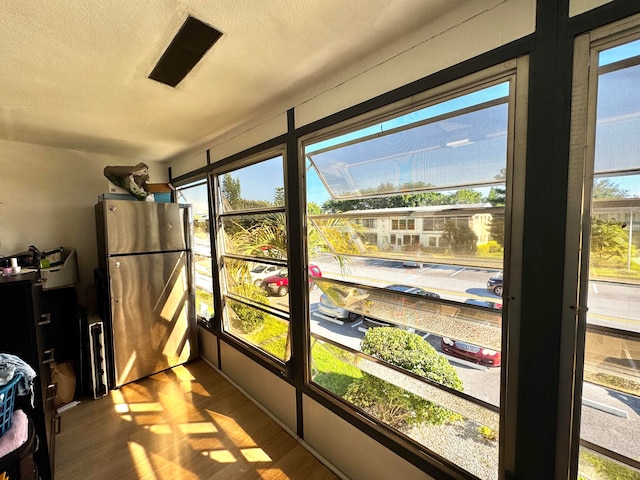 sunroom / solarium with plenty of natural light