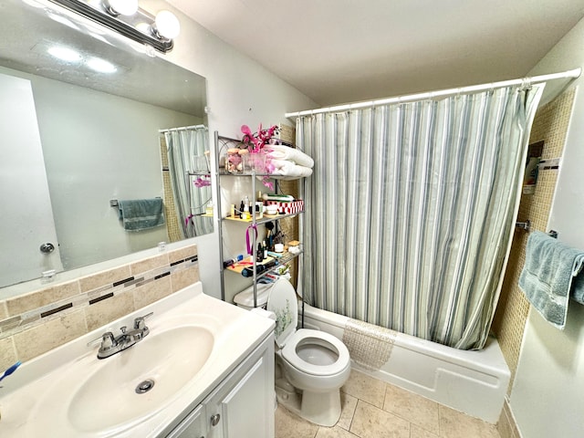 full bathroom with tasteful backsplash, tile patterned floors, toilet, vanity, and shower / tub combo