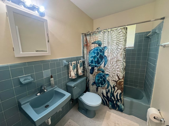 bathroom featuring shower / bath combo with shower curtain, tile walls, tile patterned flooring, and toilet