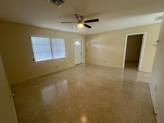 spare room featuring ceiling fan