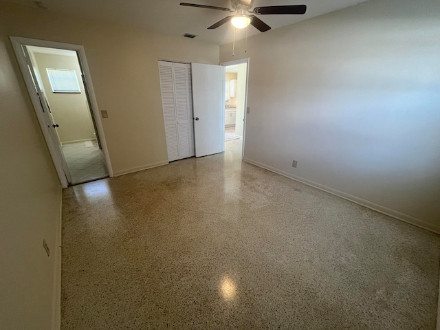 unfurnished bedroom with a closet and ceiling fan