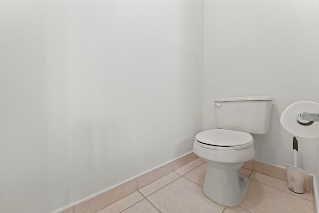 bathroom featuring tile patterned floors and toilet