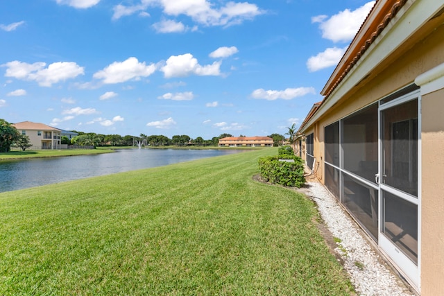 view of yard with a water view