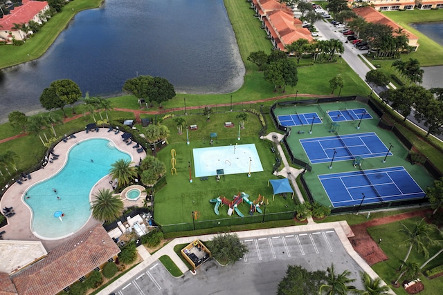 bird's eye view with a water view