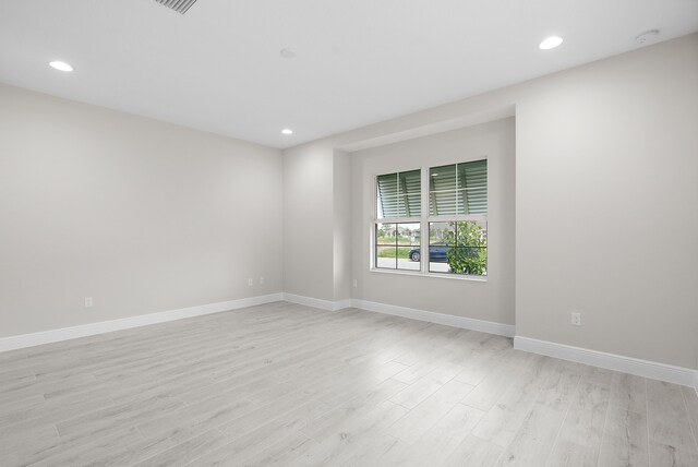 empty room featuring light hardwood / wood-style floors