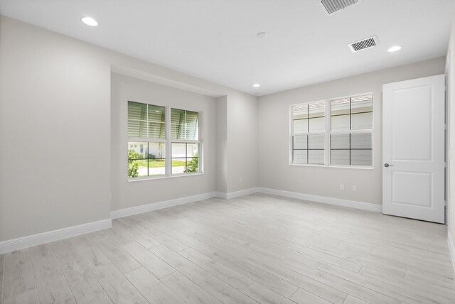 empty room featuring light hardwood / wood-style floors