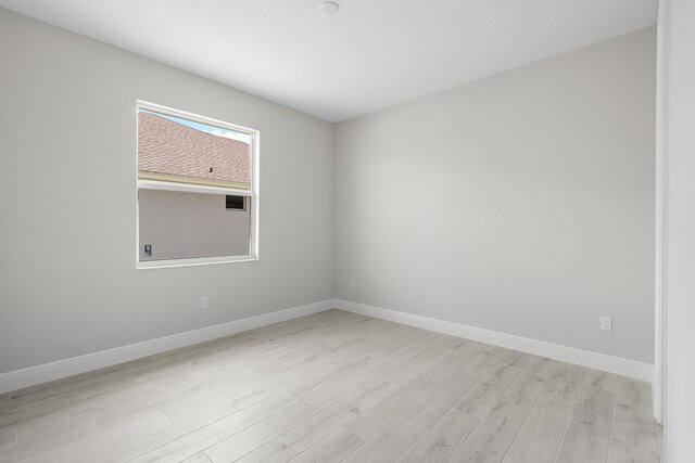 empty room featuring light hardwood / wood-style floors