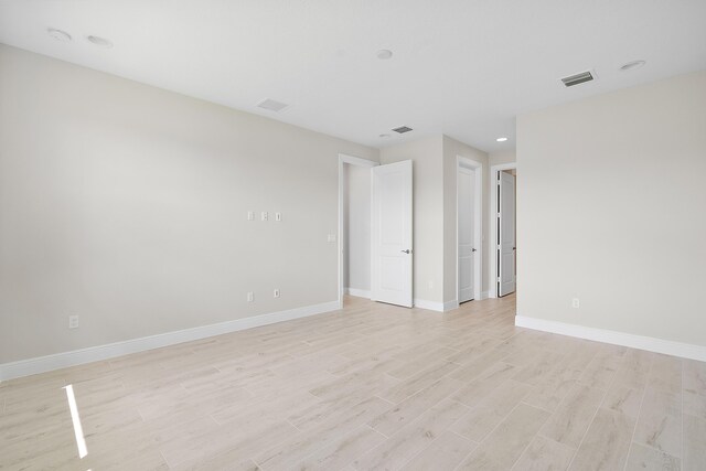 empty room featuring light hardwood / wood-style floors