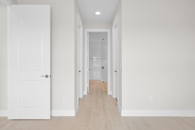 hall featuring light wood-type flooring