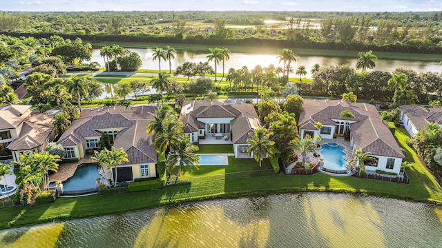 bird's eye view with a water view