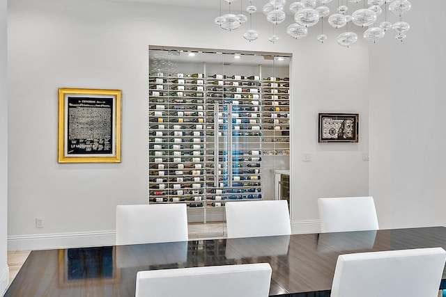 wine area featuring wood-type flooring