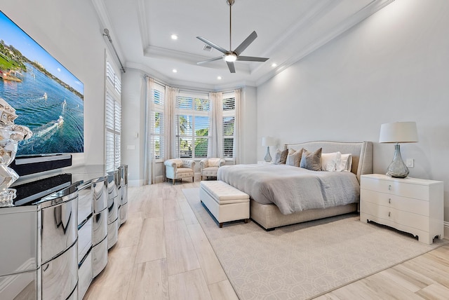 bedroom featuring ceiling fan, light wood-type flooring, and ornamental molding