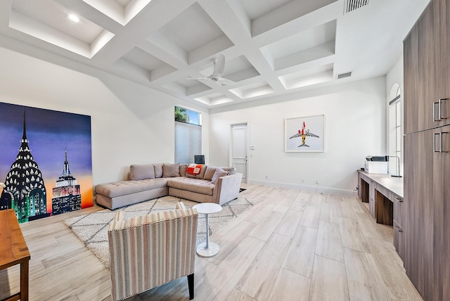 living room with light hardwood / wood-style flooring, beam ceiling, ceiling fan, and coffered ceiling