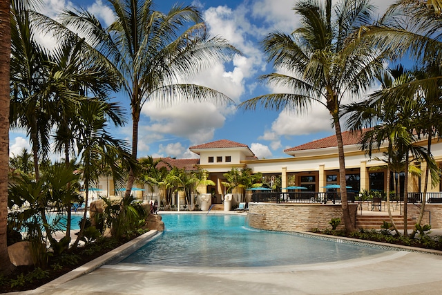 view of swimming pool with a patio