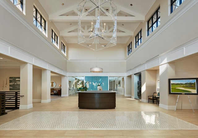 reception area featuring an inviting chandelier