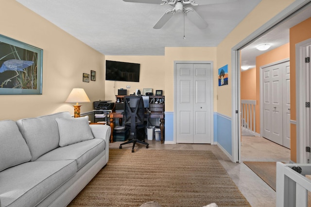 living room with ceiling fan