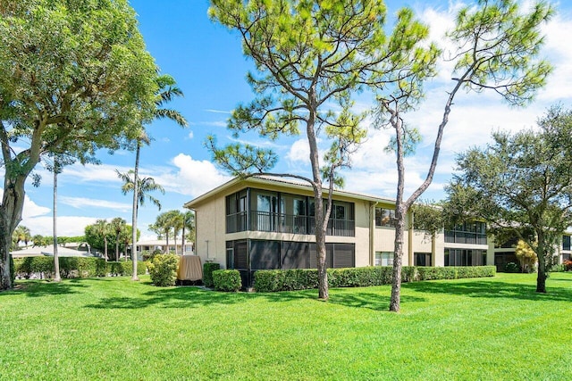 view of home's exterior featuring a lawn