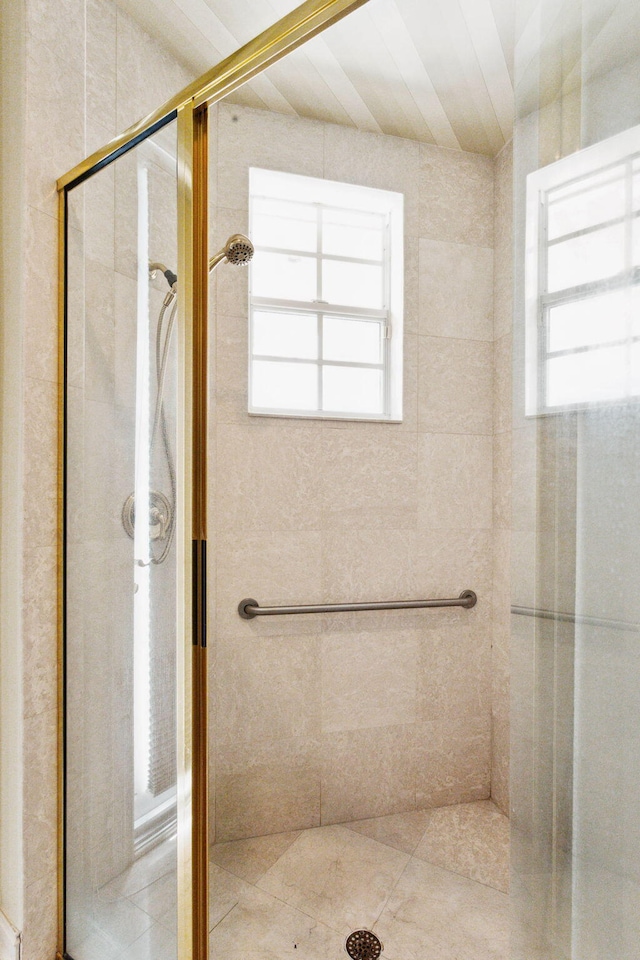 bathroom with an enclosed shower