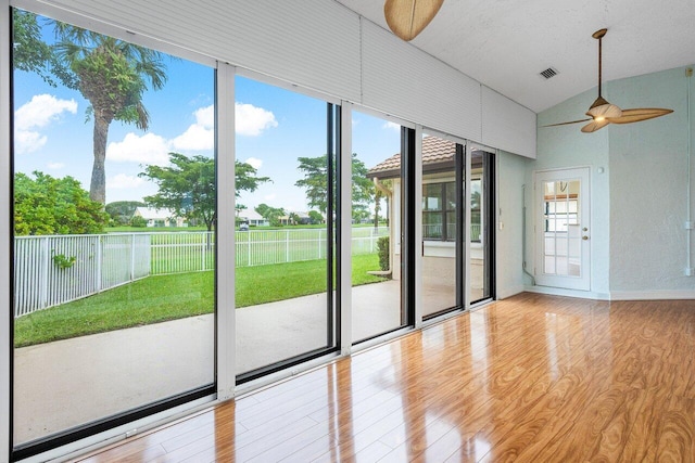 entryway featuring high vaulted ceiling, ceiling fan, and light hardwood / wood-style floors