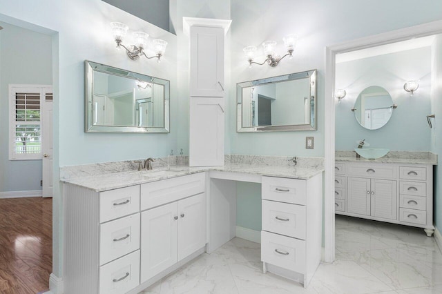 bathroom featuring hardwood / wood-style floors and vanity
