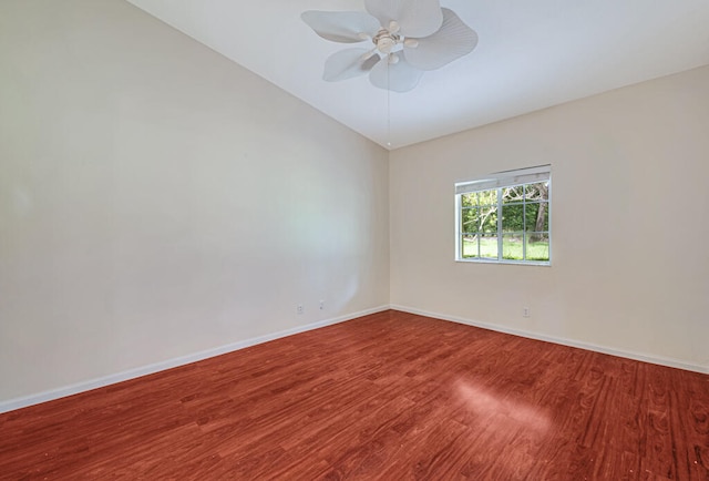 unfurnished room with ceiling fan, lofted ceiling, and hardwood / wood-style floors