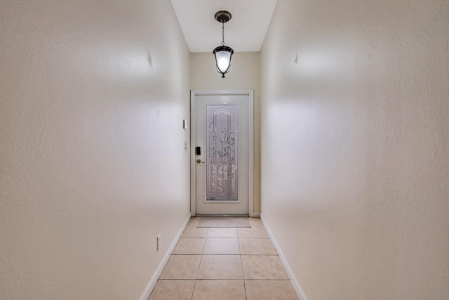 entryway featuring light tile patterned floors