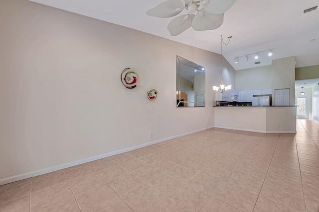 unfurnished room featuring light tile patterned flooring, ceiling fan with notable chandelier, and rail lighting