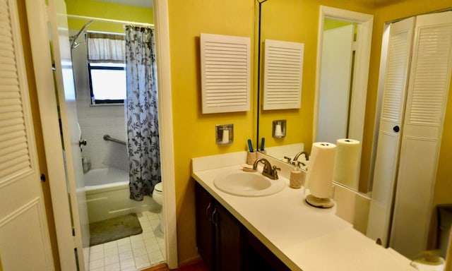 full bathroom with shower / bath combination with curtain, vanity, toilet, and tile patterned floors