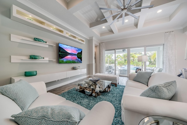 living room featuring coffered ceiling, beam ceiling, ceiling fan, hardwood / wood-style flooring, and ornamental molding