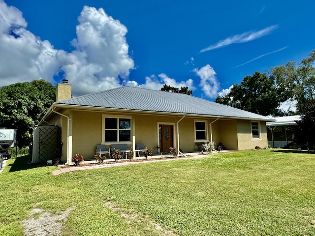 view of front of house with a front lawn