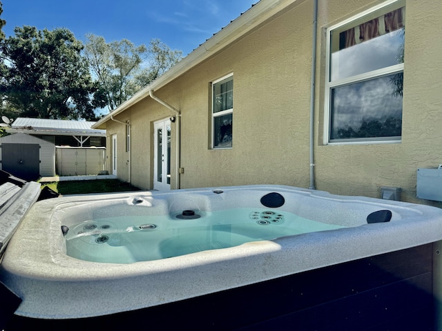 view of patio featuring a hot tub