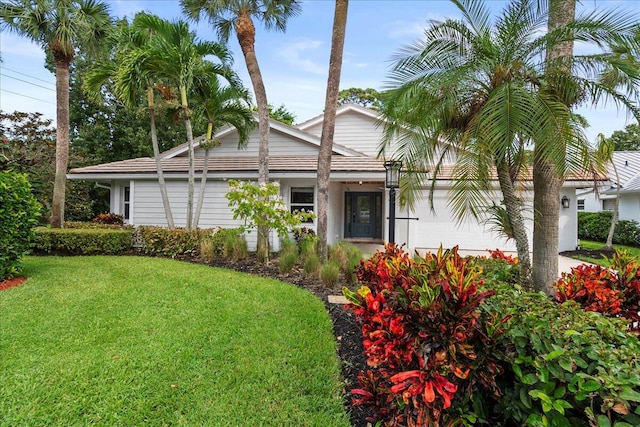 view of front of property with a front lawn