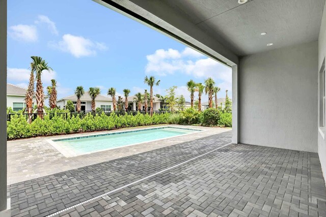 view of pool with a patio area