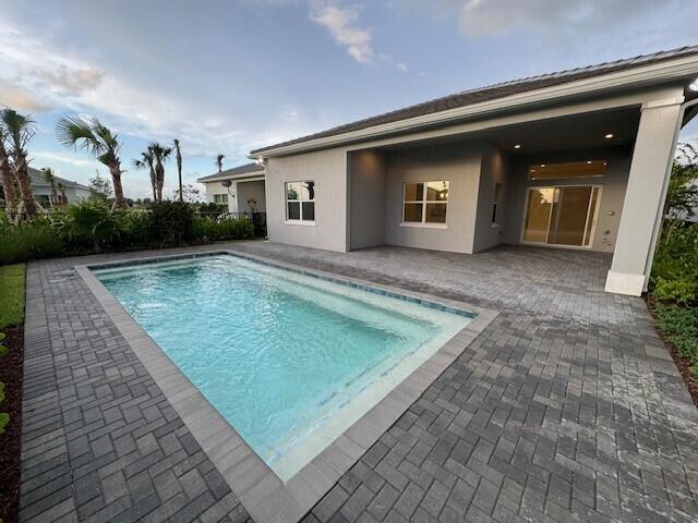 view of pool featuring a patio