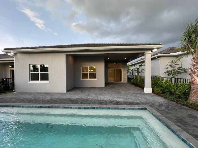 rear view of property with a patio area