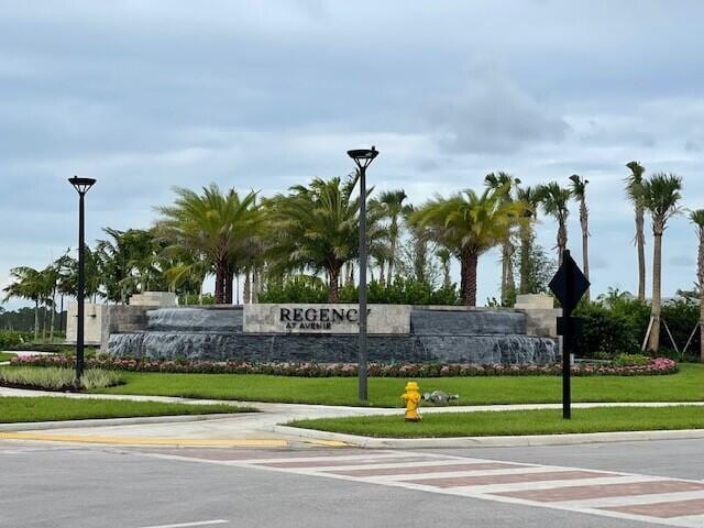 community sign with a lawn