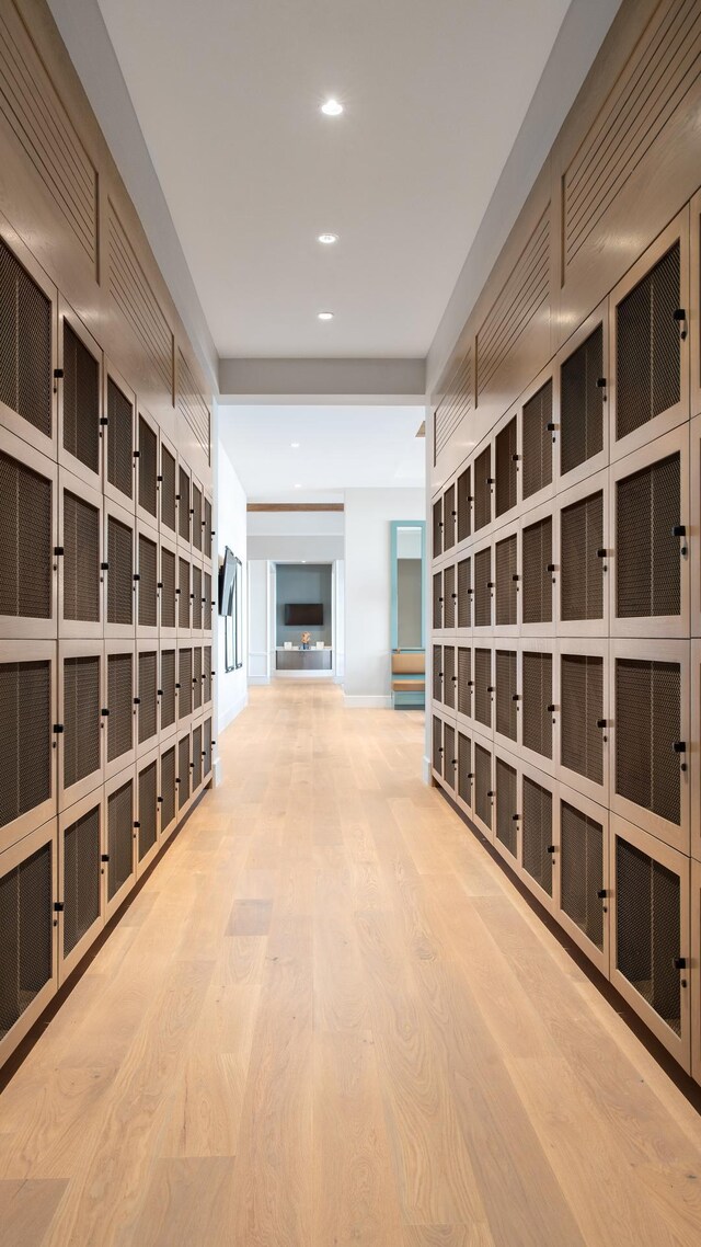 wine area with hardwood / wood-style flooring