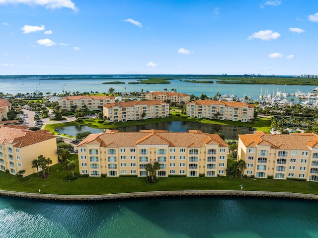 birds eye view of property featuring a water view